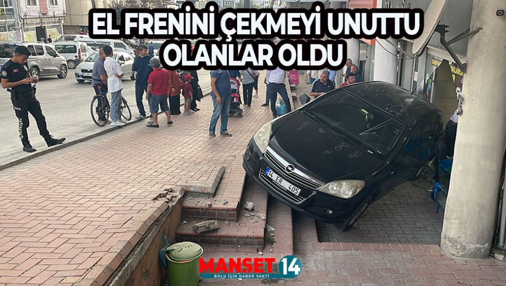 BOLU'DA EL FRENİ ÇEKİLMEYEN OTOMOBİL DÜKKANA ÇARPTI