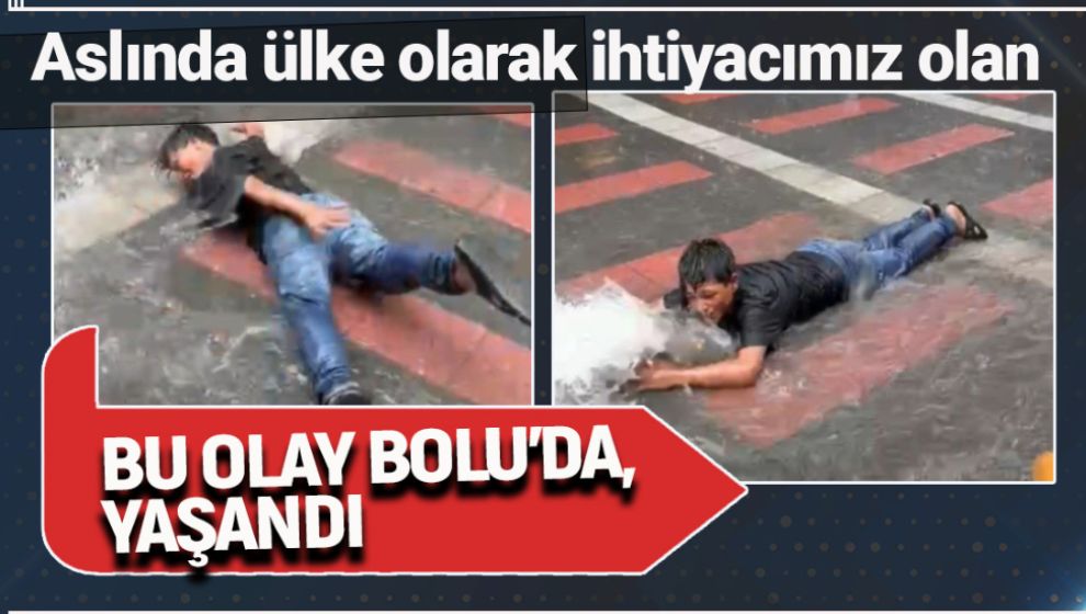 SOKAKTA BİRİKEN SUDA ÇOCUĞUN GÜLÜMSETEN EĞLENCESİ