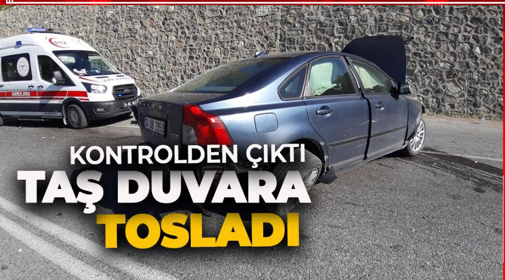 KONTROLDEN ÇIKAN OTOMOBİL TAŞ DUVARA TOSLADI