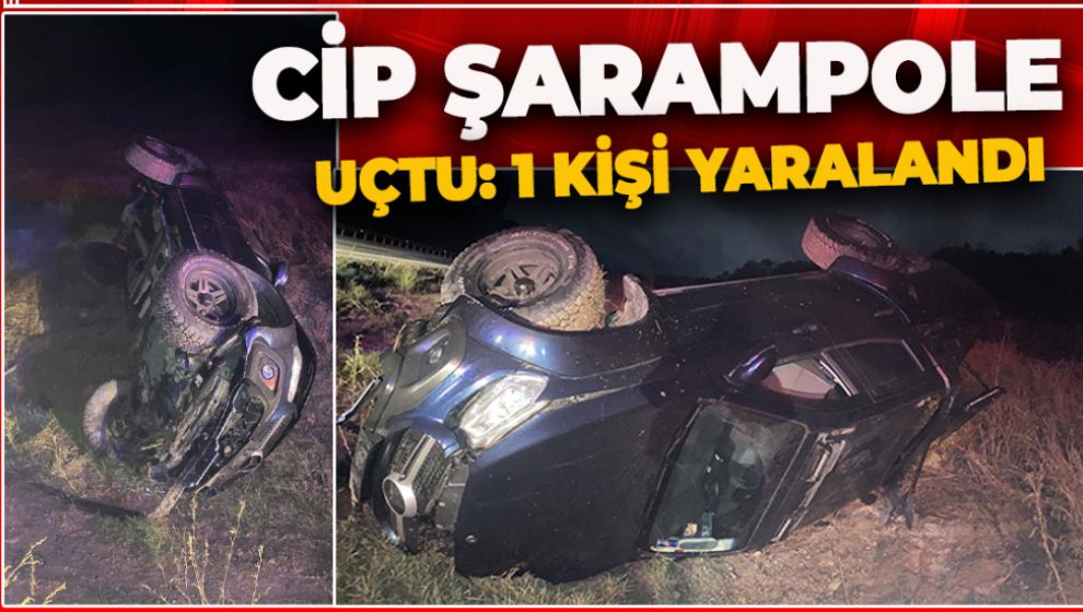 YAĞMURLU YOLA TUTUNAMAYAN CİP ŞARAMPOLE DEVRİLDİ