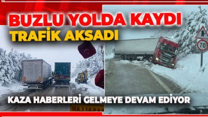 BUZLU YOLDA KAYAN TIR TRAFİĞİ AKSATTI